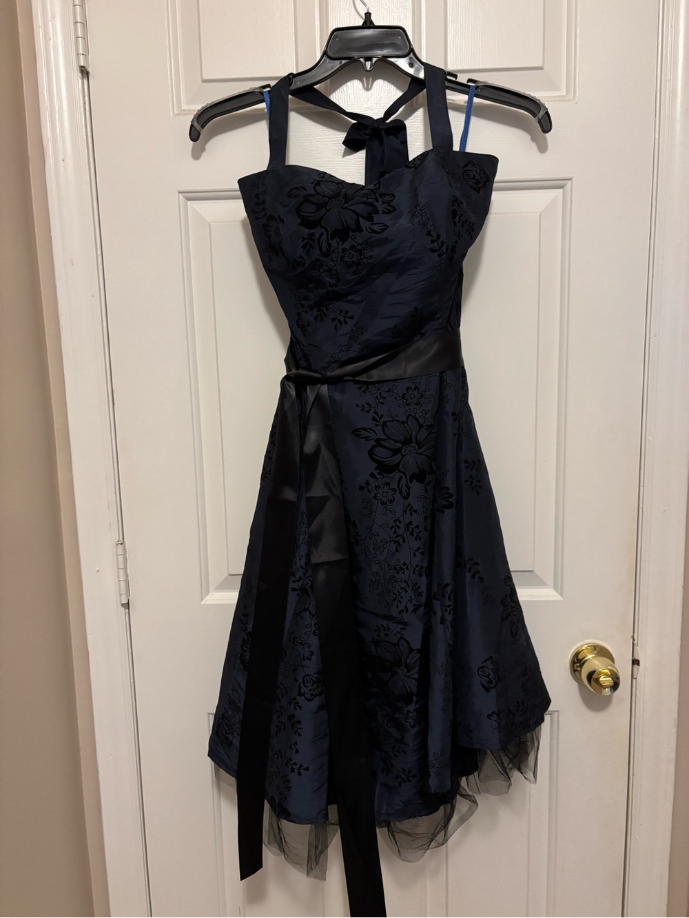 Shimmery dark blue party dress with black floral flocking